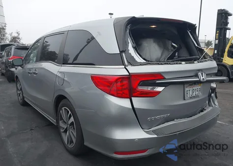 2021 Honda Odyssey Touring from USA, damaged, VIN 5FNRL6H88MB000217